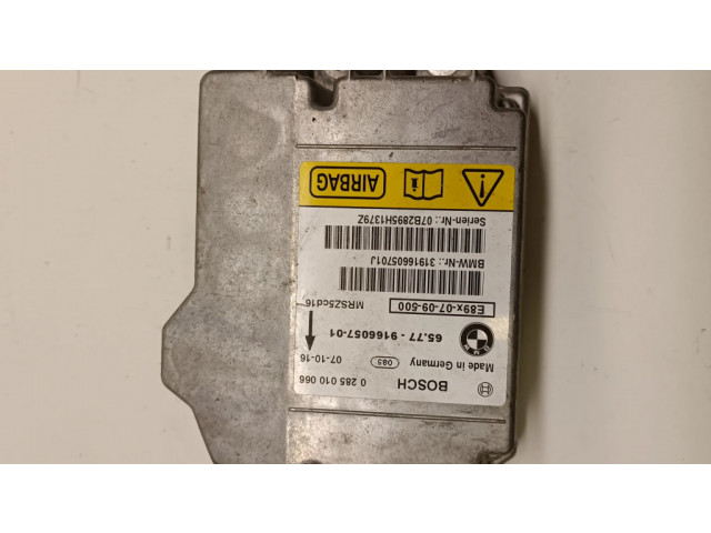 Блок подушек безопасности 65779166057, 0285010066   BMW 1 E81 E87