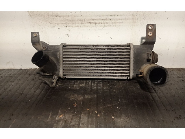Интеркулер  RF3F13565B, 90300   Mazda 323 